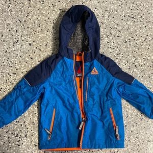 Kids warm weather jacket. A warm fleece inside.